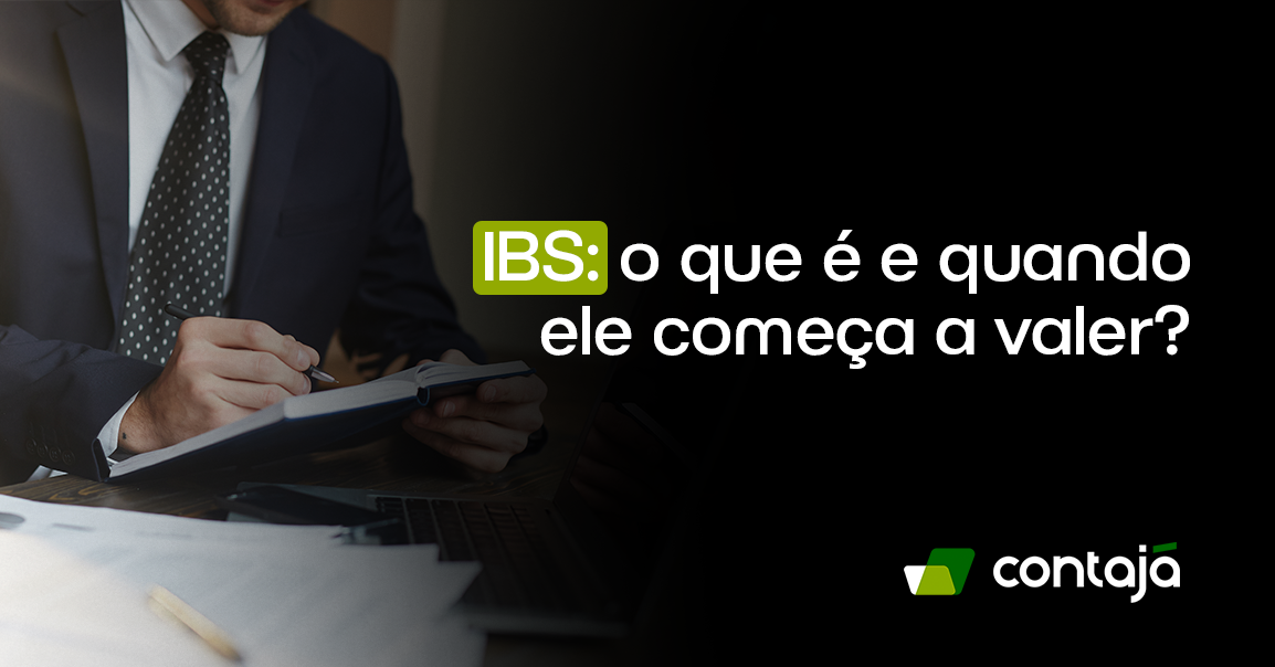Uma pessoa vestindo um terno e gravata preta está escrevendo em um caderno. No canto direito da imagem, está o título do artigo: "IBS: oq eu é e quando ele começa a valer?"