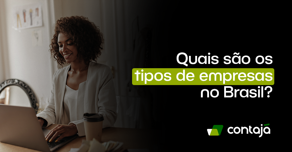 Mulher negra com cabelo preto cacheado, ela está sentada de frente para uma mesa de escritório e sobre a mesa tem um notebook cinza e um copo de café. No canto direito da imagem, está o título do artigo: "Quais são os tipos de empresas no Brasil?"